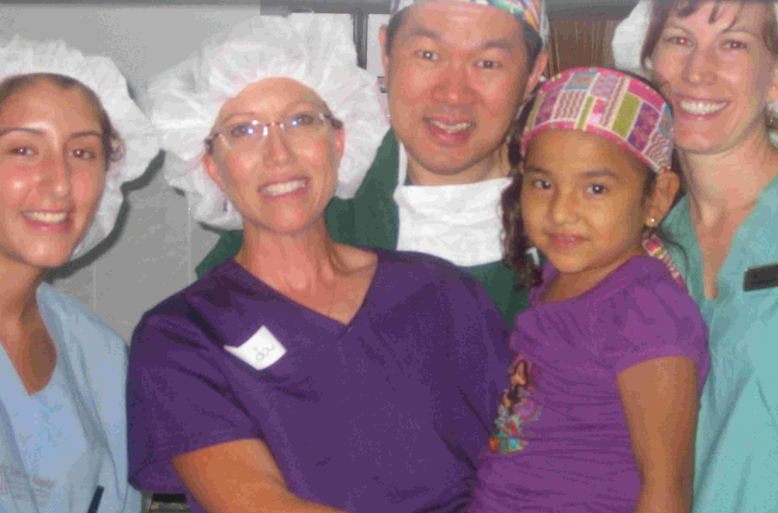 Dr. Kung with smiling nurses